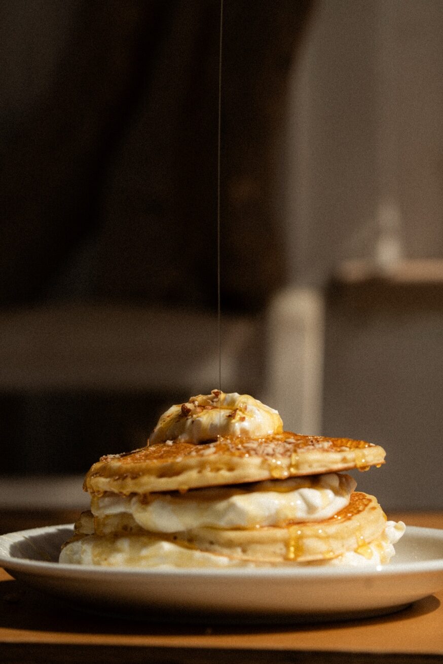 Buttermilk pancakes with honey drizzle at Mykonos Brunch Club Mykonos