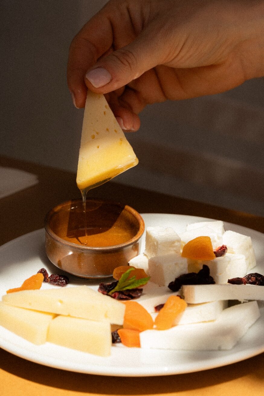Greek cheese selection with feta, graviera and raw honey at Mykonos Brunch Club