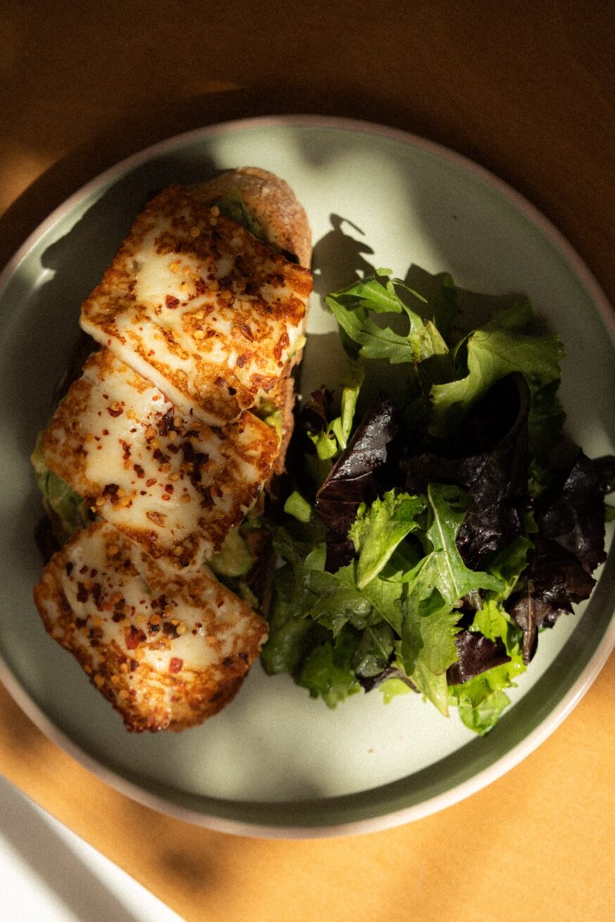 Haloumi toast with crushed avocado, chilli flakes and Greek honey at Mykonos Brunch Club