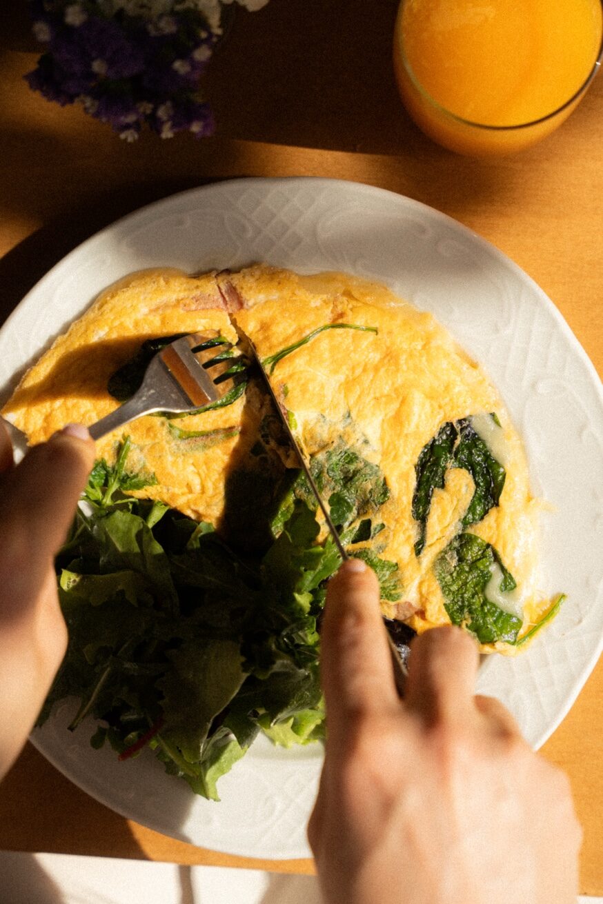 Spinach omelette with fresh juice at Mykonos Brunch Club Mykonos Town