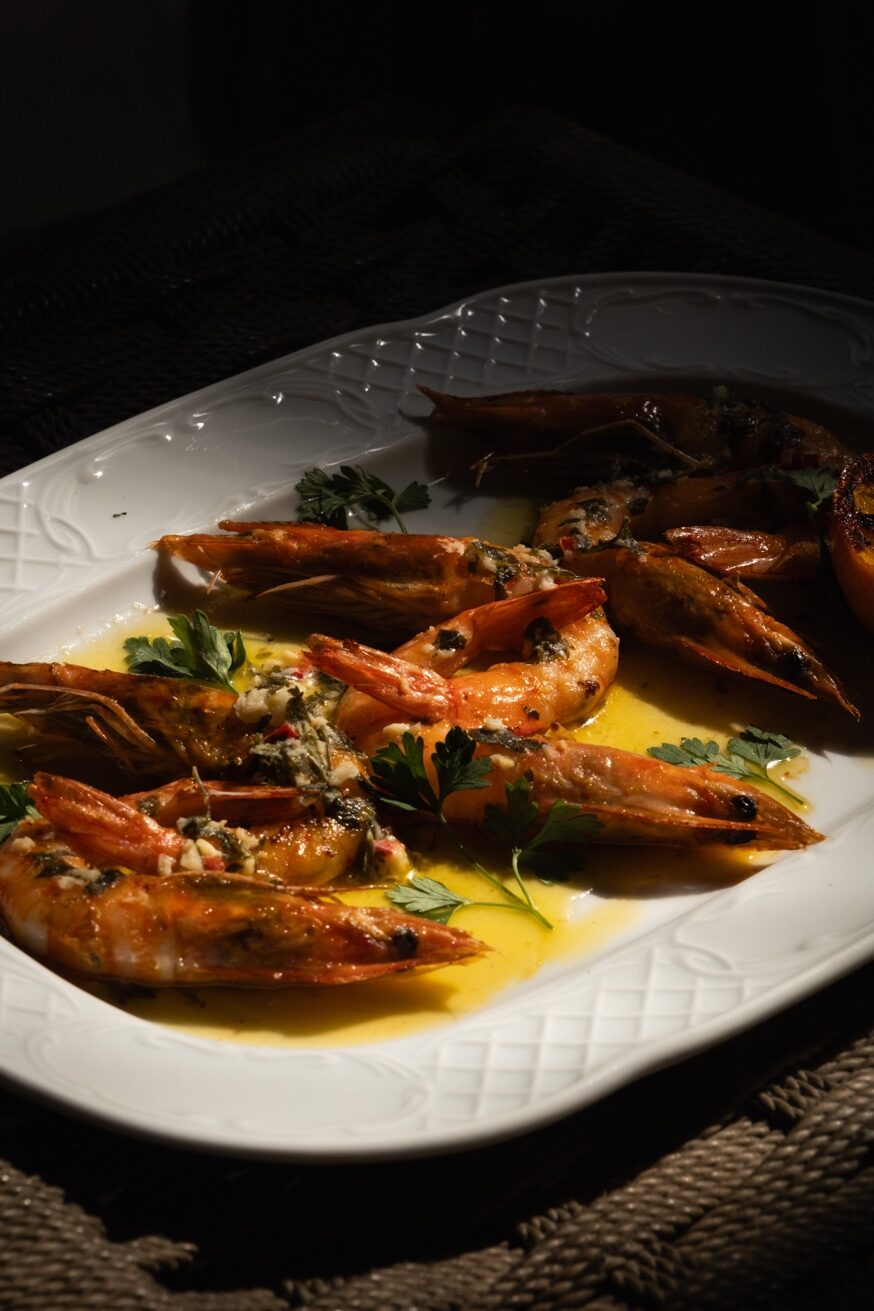 Lemon butter prawns cooked on open fire at Pūblico Restaurant Mykonos